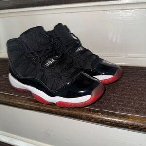 Jordan Black and Red Sneakers with Patent Leather and Translucent Outsole